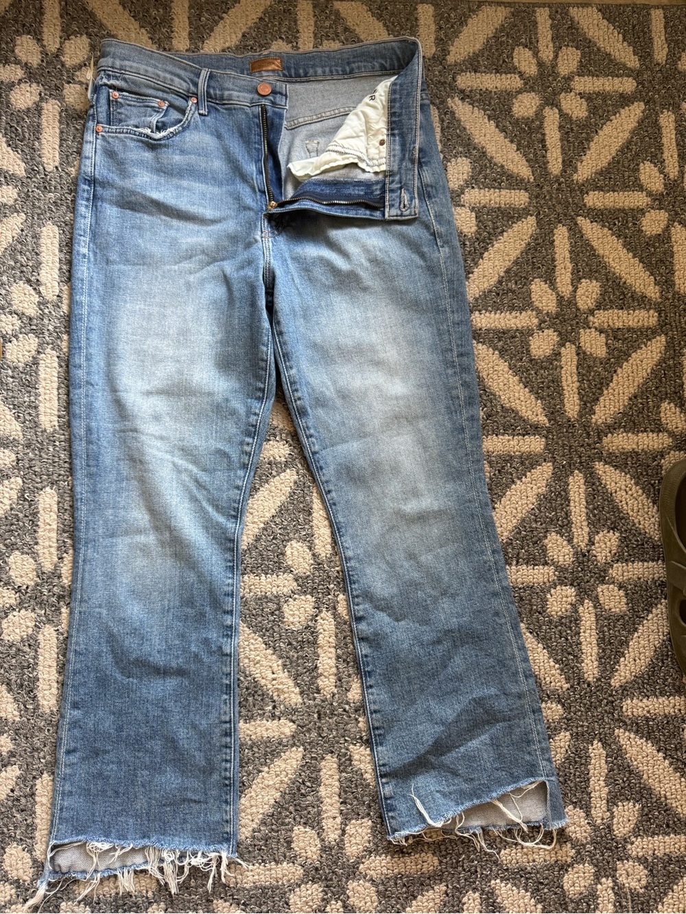 MOTHER Light Blue Flare Jeans with Raw Hem